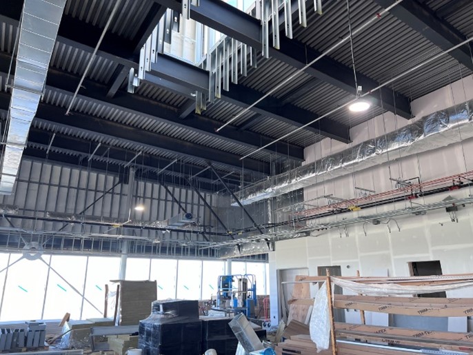 Interior image of Carrville Library. Ceiling hangers in place.